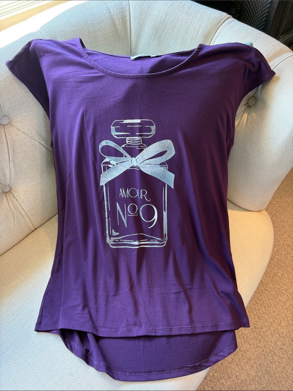 Ricki's Plum Short Sleeve Scoop Neck Tee with Silver Perfume Graphic